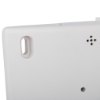 Close-up of a white doorsense showing a fixing point and small ventilation holes on a textured surface
