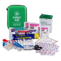 Image showing the Decakit1 Deca Med Outdoor First Aid Kit with full kit contents including bandages, swabs, scissors, and a guide to basic first aid
