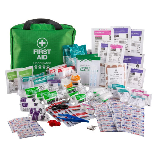 Green Decakit3 Deca Med Large First Aid Kit bag with various medical supplies and dressings displayed around it