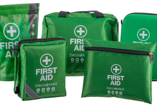 Image showing various green First Aid Kits with white cross and text on different sized pouches and bags