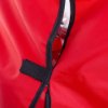 Close-up of a large extinguisher cover showing a black velcro fastening on red fabric