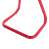 Close up of the base of a single red metal extinguisher stand showing the metal frame and rounded corners