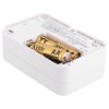carbon monoxide alarm showing the battery compartment with two AA batteries inside