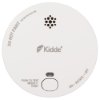 Front view of a round smoke alarm with a test button and ventilation holes visible