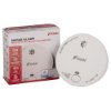 Smoke alarm shown outside and inside its retail packaging with brand and instructions visible