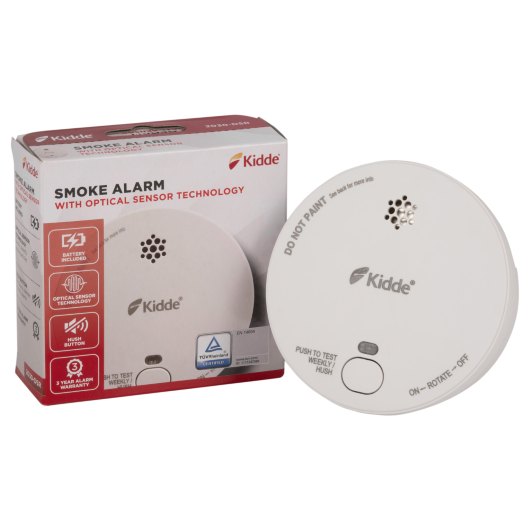 Smoke alarm shown outside and inside its retail packaging with brand and instructions visible