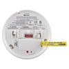 Back view of the kidde firex mains powered optical smoke alarm alkaline battery showing warnings and battery compartment tab