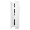 Side view of kidde firex mains powered optical smoke alarm alkaline battery backup showing its profile and vents