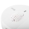 Closeup of Kidde Firex mains powered heat alarm alkaline battery backup showing vent and button on white casing
