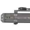 The back of a grey metal door closer stamped with made by rutland with a label showing the CE and UKCA certification
