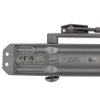 Close-up view of the back of a silver rutland overhead door closer showing the label and arm mechanism
