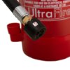 Close-up of the nozzle on a 3ltr water mist, showing its metal and black plastic parts with a red background