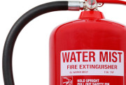 A red water-mist fire extinguisher with a white label